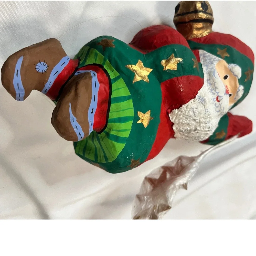 Paper‎ mache Flying Santa with gold stars